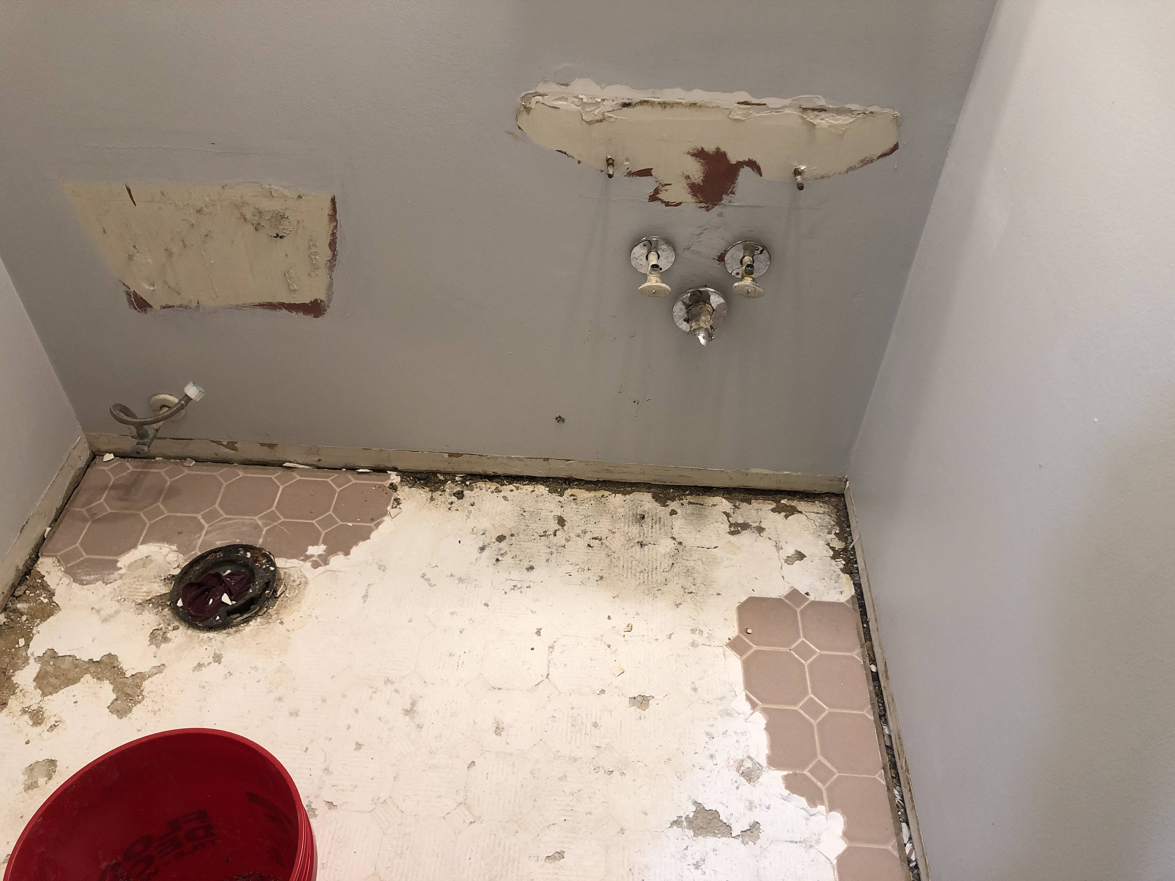 DIY Half-Bath Renovation floor removal