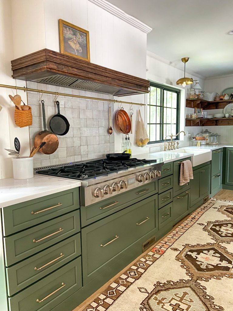 Photo of kitchen featuring Forté dishwasher and cooktop.
